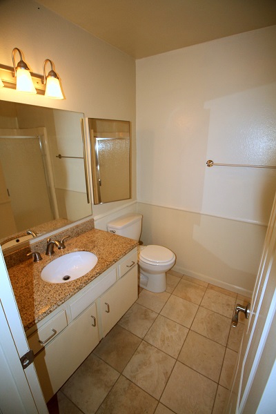 Full Bathroom on second level with granite counter and Travertine marble floor