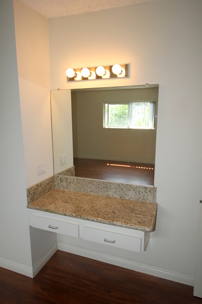 Makeup area in Master Bedroom with granite counter